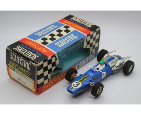 Scalextric - A boxed vintage Scalextric 1969-72 'Race Tuned' C14 Matra GP, in blue with RN3, white driver with green helmet, 