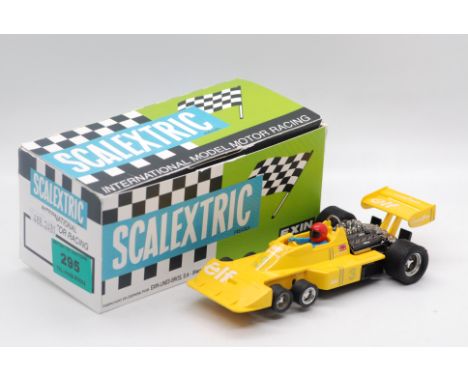 Scalextric Exin (Spain) - A boxed Scalextric Exin #4054 Tyrell F1 P-34. The model in yellow with RN3, marked 'Made in Spain' 