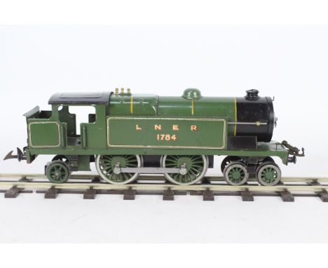 Hornby - A 1930s O gauge 4-4-2 tank engine in LNER green livery operating number 1784. # No.2. The model has been converted t