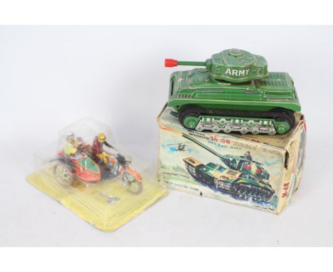 Nomura, Paya - A vintage boxed Nomura (Japan) battery operated tinplate M-48 Army Tank., with a modern Paya Moto Tuf Tuf 1936