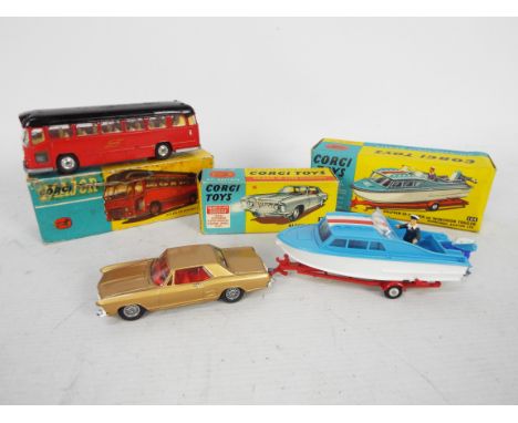 Corgi - 3 x boxed models, Buick Riviera # 245, a Dolphin 20 Cruiser # 104 and a Midland Red Motorway Express Coach # 1120. Al
