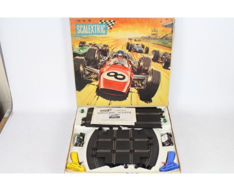 Scalextric - A boxed vintage Scalextric #45 Rally Set. The set contains two racing minis - RN 2 in Green, with RN3 in black; 