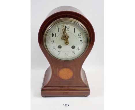 An Edwardian mahogany and satinwood inlaid mantel clock of balloon form with striking movement, 30cm 