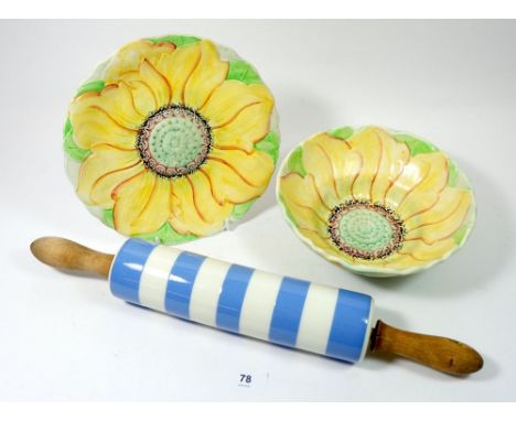 A Hillwood 1930's sunflower strainer dish and a Cornishware rolling pin