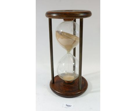 A large sized wooden and glass egg timer, 34cm 