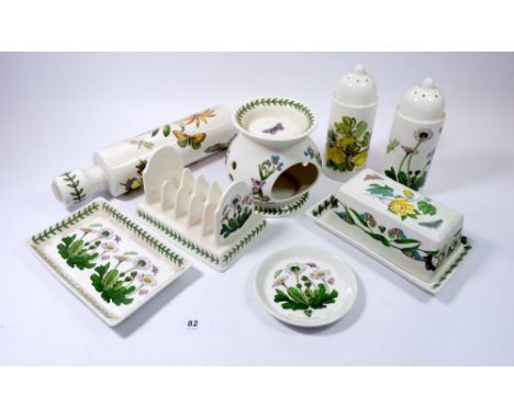 A Portmeirion group of items including butter dish, rolling pin, toast rack, pin dish, oil diffuser, two castors and rectangu