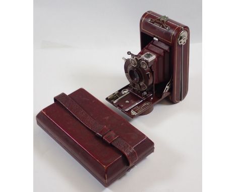 A Kodak Vanity III series red cased pocket camera and case 