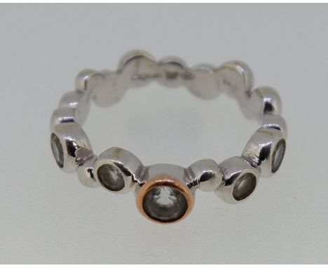 A Clogau silver ring set white stones, boxed 