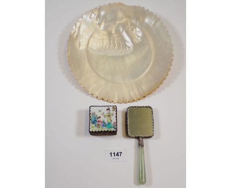 An oriental porcelain vanity mirror and trinket box with painted decoration and gilt metal mounts and a mother of pearl plate