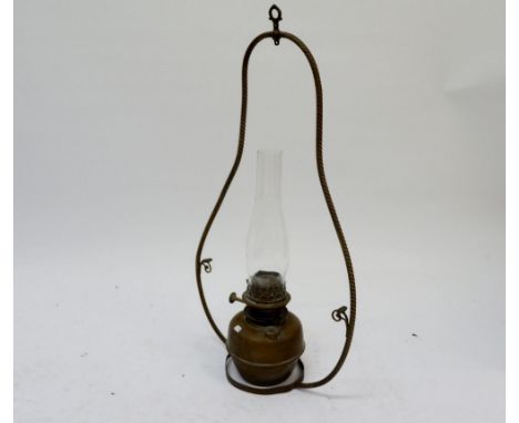 A 19th century brass hanging oil lamp 