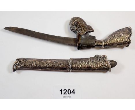 A small Eastern white metal and horn dagger in the form of a musket 22cm long 