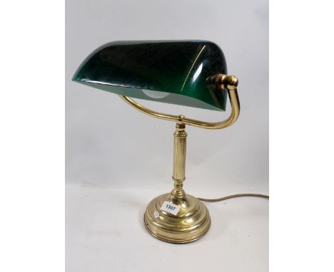 A brass bankers desk lamp with green glass shade 