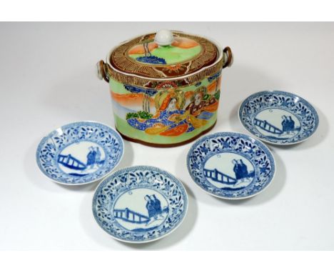 A Japanese biscuit barrel painted figures seated in a landscape and four blue and white saucers