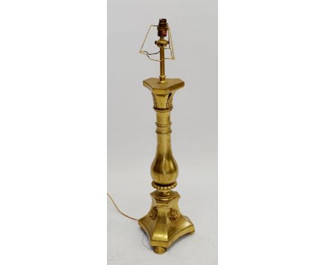 A large gilt brass table lamp of baluster form with applied stiff leaf and lion mask decoration, total 85cm 