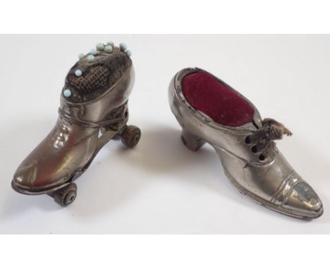 A  Victorian pin cushion in the form of a roller skate, 6cm and another shoe form one 