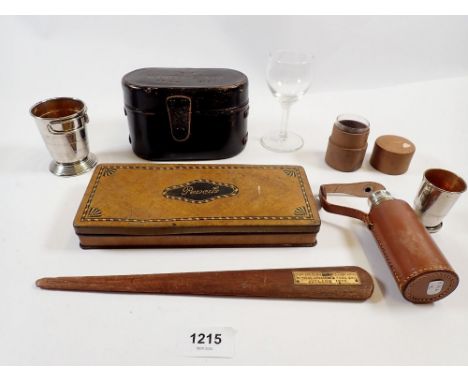 A cut glass and chrome plated stirrup cup and flask with screw lid and glass stopper, a sugar measure cased, a sealing wax se