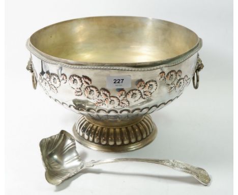 A large silver plated punch bowl embossed floral decoration with ladle 