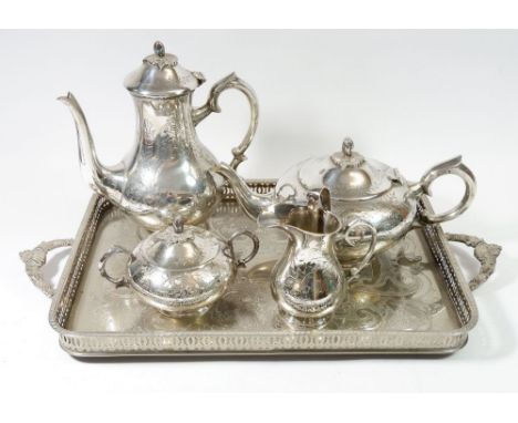 A silver plated four piece tea service on a silver plated tray 