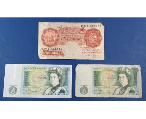 Two one pound notes and an early L K O'Brien ten bob note 