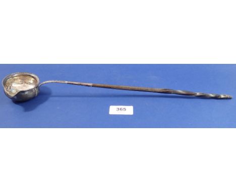 A Georgian silver punch ladle with horn handle, marks worn 39cm long 