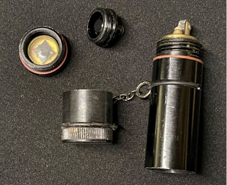 WW2 British RAF/SOE Cigarette Lighter with hidden escape compass. 78mm in length. Unissued condition. 