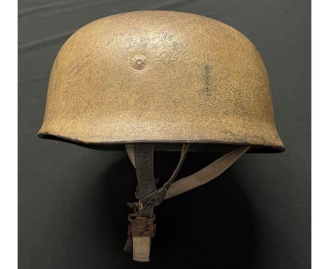 WW2 Third Reich Luftwaffe Fallschirmjager M38 Steel Helmet. Dark Tan Camo paint finish thickly brush applied over the origina