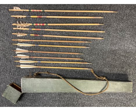 A late Victorian / early Edwardian Wooden Arrow Quiver. Painted green and fitted with a brass lock, complete with key. Contai