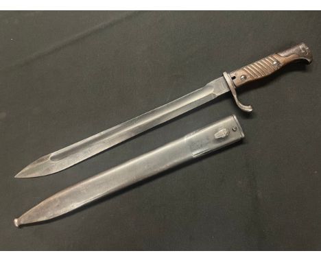 WW1 Imperial German 98/05nA Bayonet, sawback removed example with 365mm long fullered single edged blued blade, maker marked 