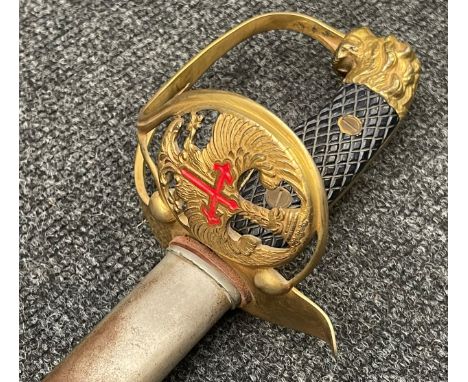 Spanish Army Officers Lion Head Sword with single edged fullered blade 760mm in length, marked "Fabrica de Toledo". Gilt guar