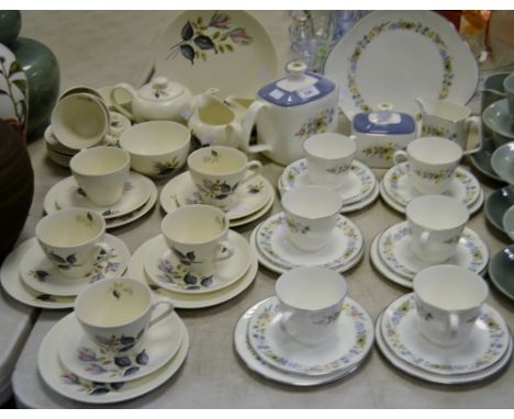A Meakin part tea service; a Royal Doulton Pastorale pattern part tea service; Woods China part tea service (3)