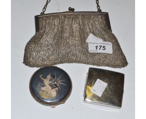 A continental silver coloured metal chain mail evening purse; a silver compact; another (3)