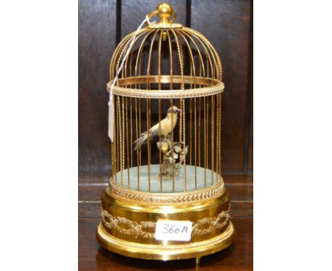 A Reuge birdcage musical automaton  , made in Switzerland