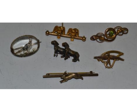 A crystal Pheasant brooch;  a gold plated Eagle brooch;  a silver running hare tie pin;  an Art Nouveau silver and enamel nec