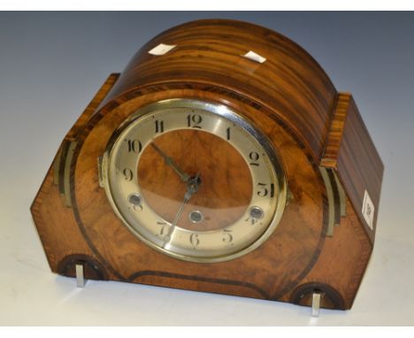 An Art Deco walnut mantel clock, Arabic numerals, silvered dial