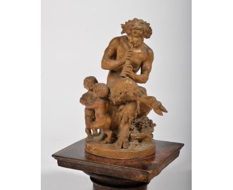 AFTER CLAUDE MICHEL, CALLED CLODION (1738-1814), A TERRACOTTA GROUP OF A SATYR  With the Satyr/faun possibly representative o