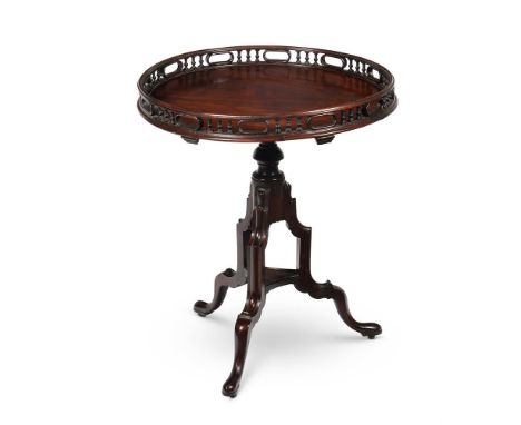 A GEORGE III MAHOGANY TRIPOD TABLE  IN THE MANNER OF THOMAS CHIPPENDALE, CIRCA 1770 With a gallery top 75cm high, the top 65c