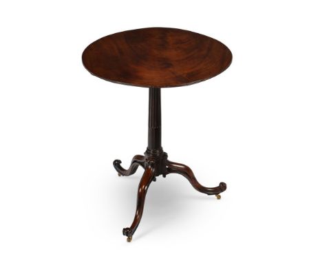 A GEORGE II MAHOGANY TRIPOD TABLE IN THE MANNER OF THOMAS CHIPPENDALE, CIRCA 1755  72cm high, the hinged top 59cm diameter   