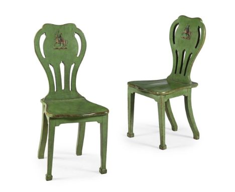 A PAIR OF EARLY GEORGE III GREEN PAINTED HALL CHAIRS CIRCA 1760  Each back centred by a painted armorial  each 96cm high, 42c