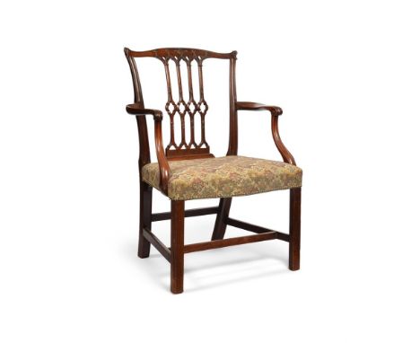 A GEORGE III 'RED WALNUT' OPEN ARMCHAIR IN THE MANNER OF THOMAS CHIPPENDALE, CIRCA 1760 97cm high, 67cm wide, 60cm deep   