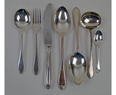 MAPPIN AND WEBB CUTLERY, twelve place setting, bead pattern, including two serving spoons and a ladle. (51)