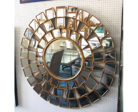 MIRROR, bevelled circular with mirrored surround on a gilded metal frame, 107cm diam.