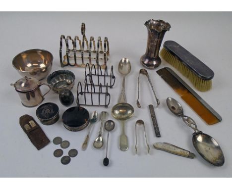 SILVER AND PLATED WARES, a miscellany of small items including toast racks, caddy spoon, dressing table and cruet items, etc.