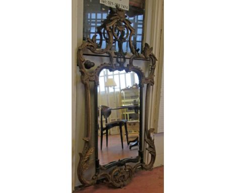 WALL MIRROR, Rococo style gilt effect and ebonised with a bevelled plate, 76cm W x 146cm H. (with slight faults)