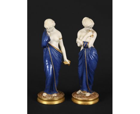 PAIR OF ROYAL WORCESTER FIGURES - JOY &amp; SORROW modelled by James Hadley, the gilded semi-nude classical figures with blue