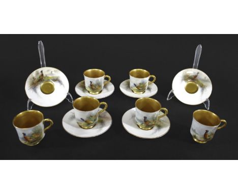 ROYAL WORCESTER COFFEE SET - JAMES STINTON a set of six coffee cups and saucers, each hand painted with Pheasants within a la