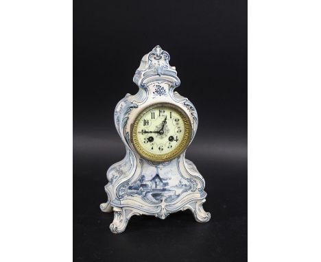 FRANZ ANTON MEHLER - GERMAN POTTERY MANTLE CLOCK made in the delft style, the pottery case painted with windmills within a la