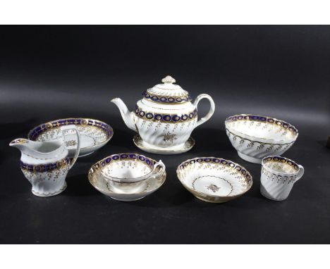 CHAMBERLAIN WORCESTER PART TEA SERVICE each piece with a fluted body, sprigs of gilded leaves and blue and gilt borders. Comp