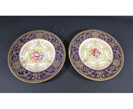 PAIR OF ROYAL WORCESTER CABINET PLATES - E PHILLIPS &amp; W H AUSTIN two plates each painted in the centre with various flowe