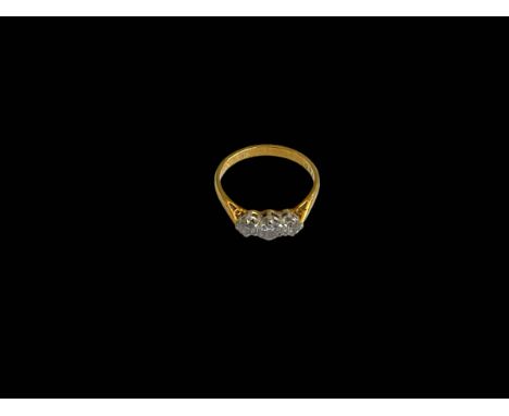 Diamond three stone 18 carat gold ring, size M.