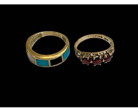 Two 9 carat gold gem set rings.